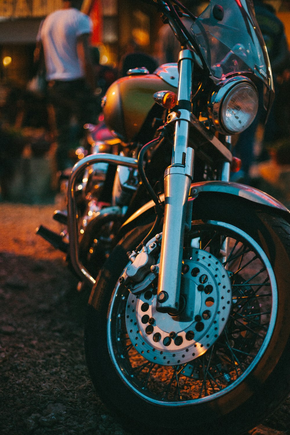 a motorcycle parked on the side of a road