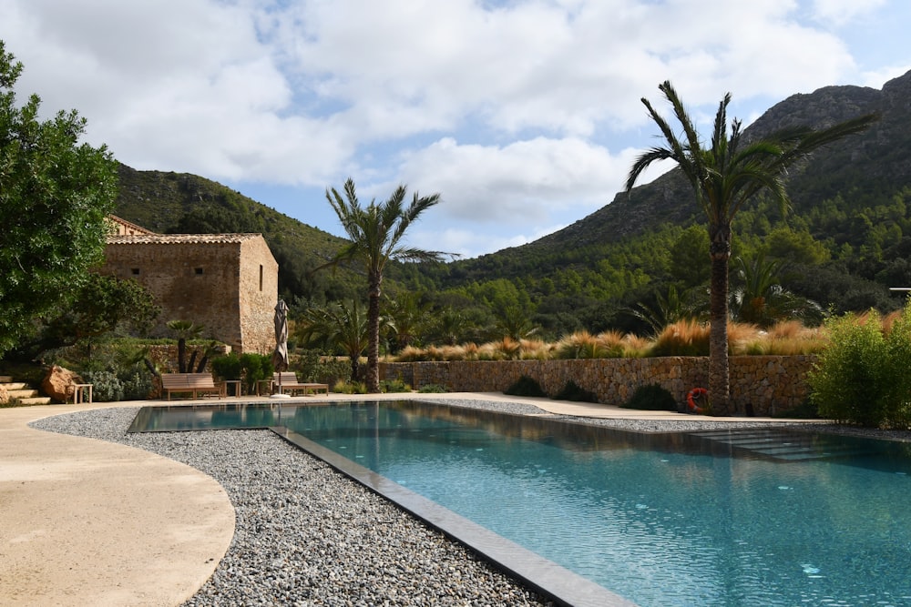 a house with a pool in the middle of it