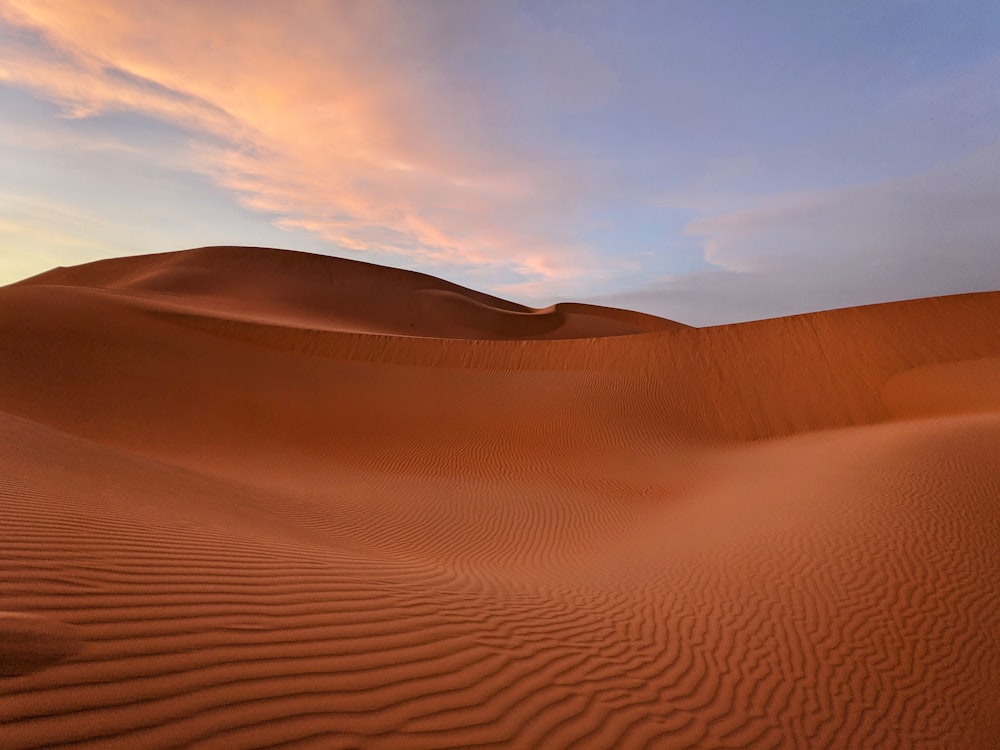 a large sand dune in the middle of a desert