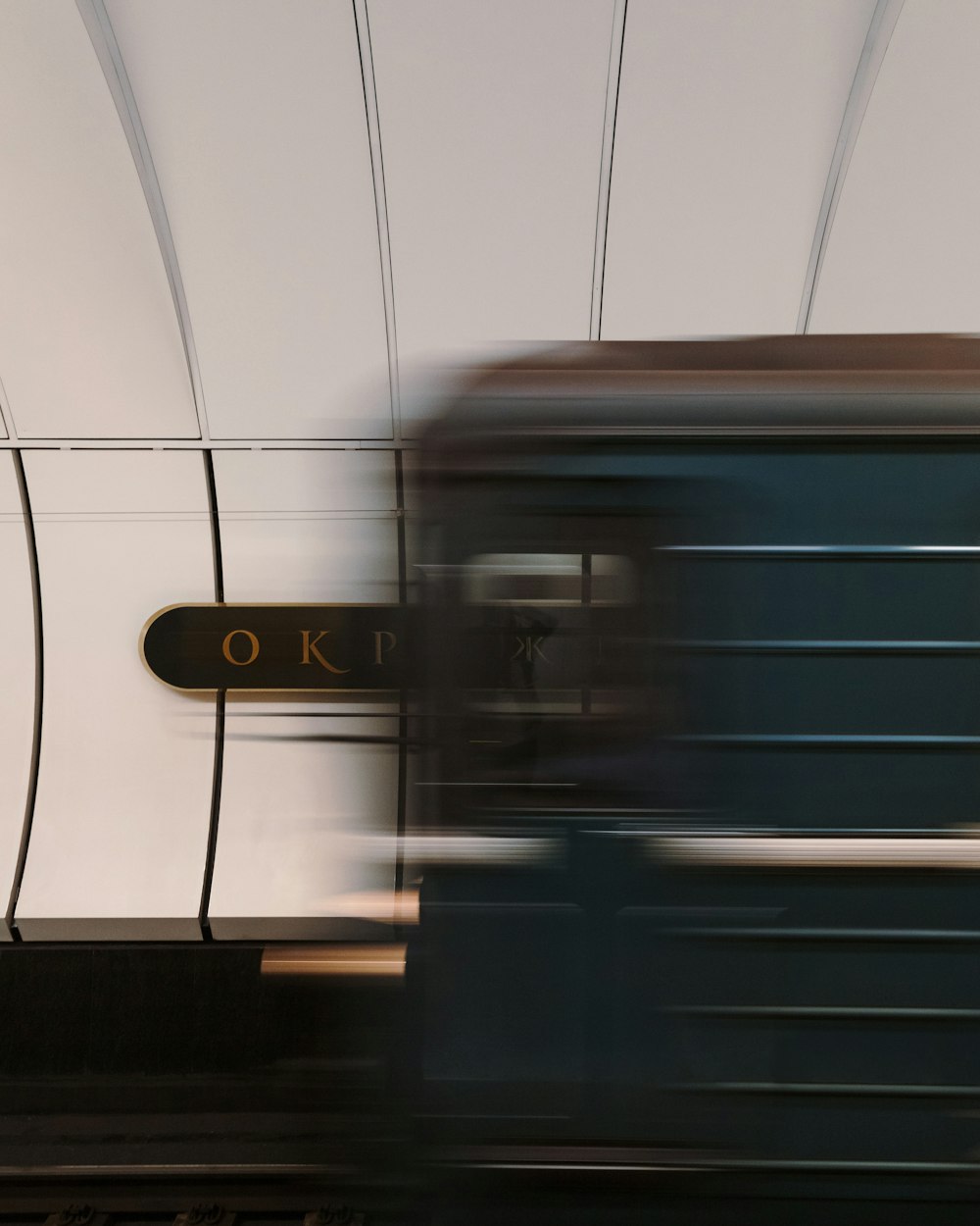 a blurry photo of a train passing by