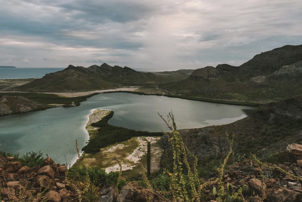 a large body of water surrounded by mountains