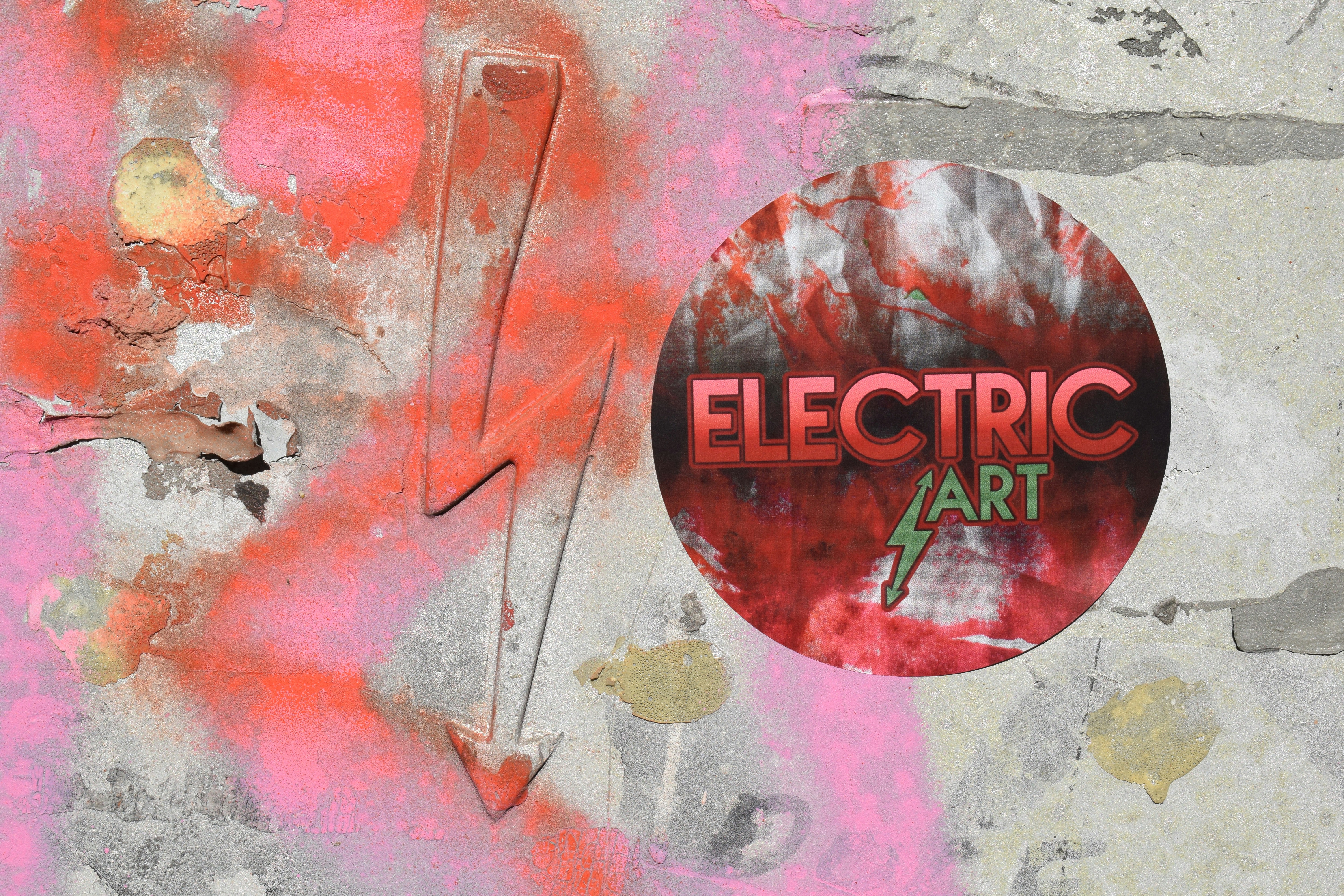 a picture of a sign on a wall that says electric art