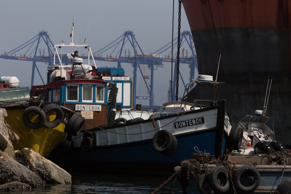 a couple of boats that are sitting in the water