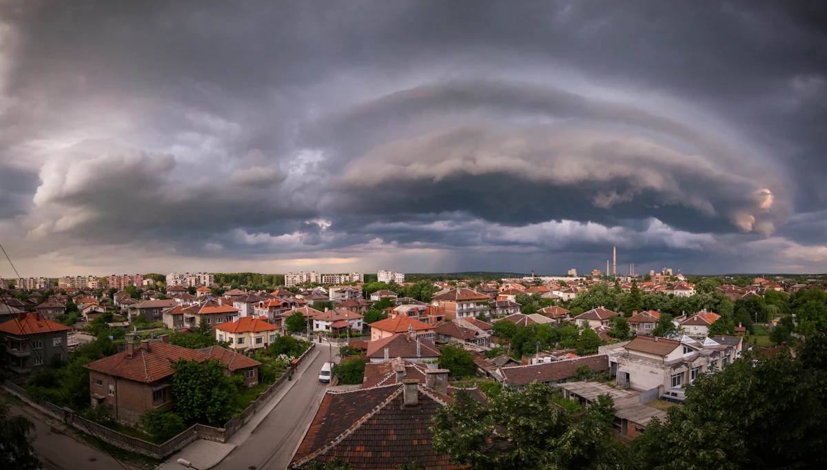 A storm rolling in over a small town