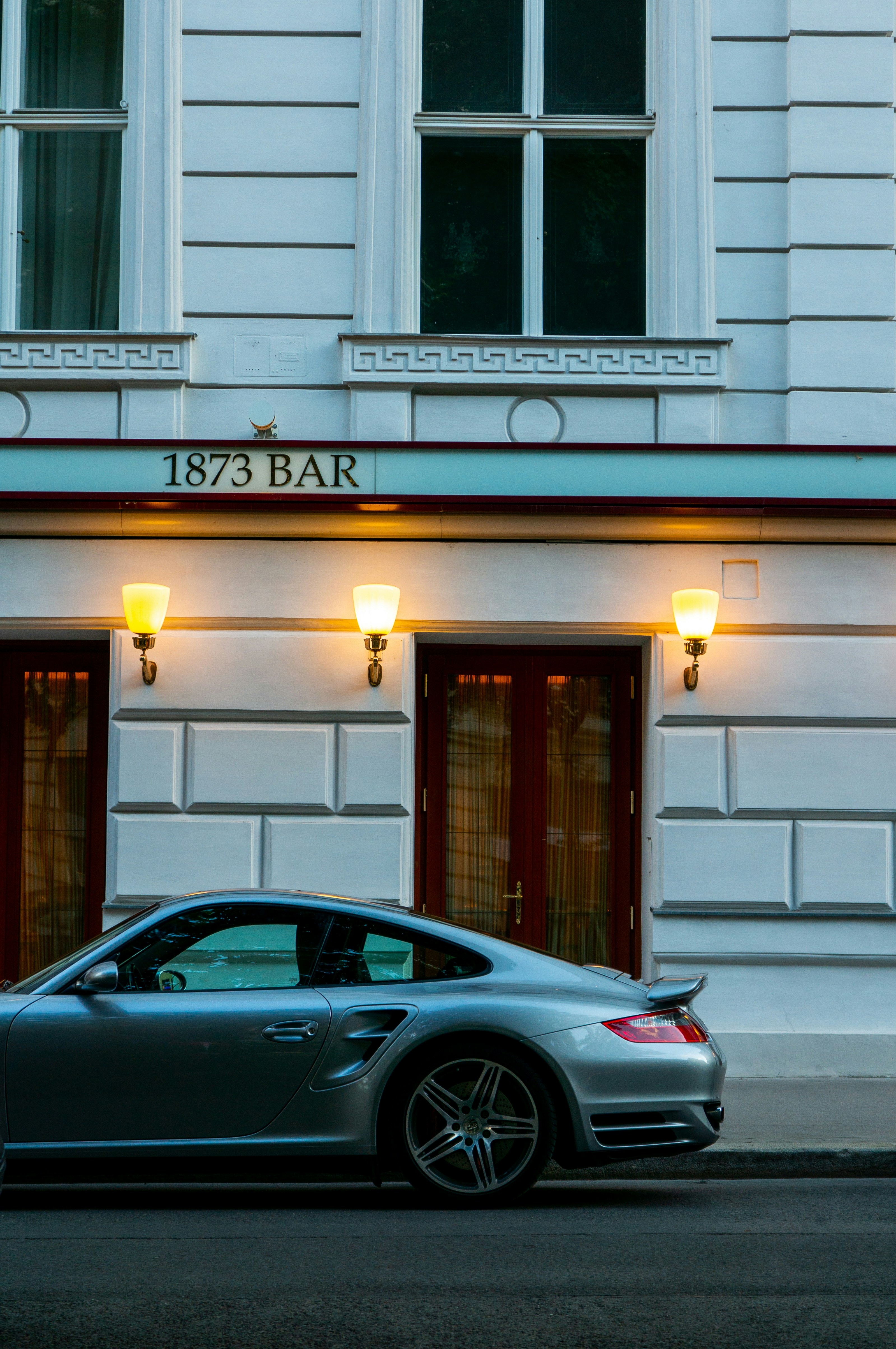 A car parked in front of a building photo – Free Wien Image on Unsplash