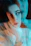 A soft-focus artistic portrait of a woman in natural light, evoking subtle sensuality.