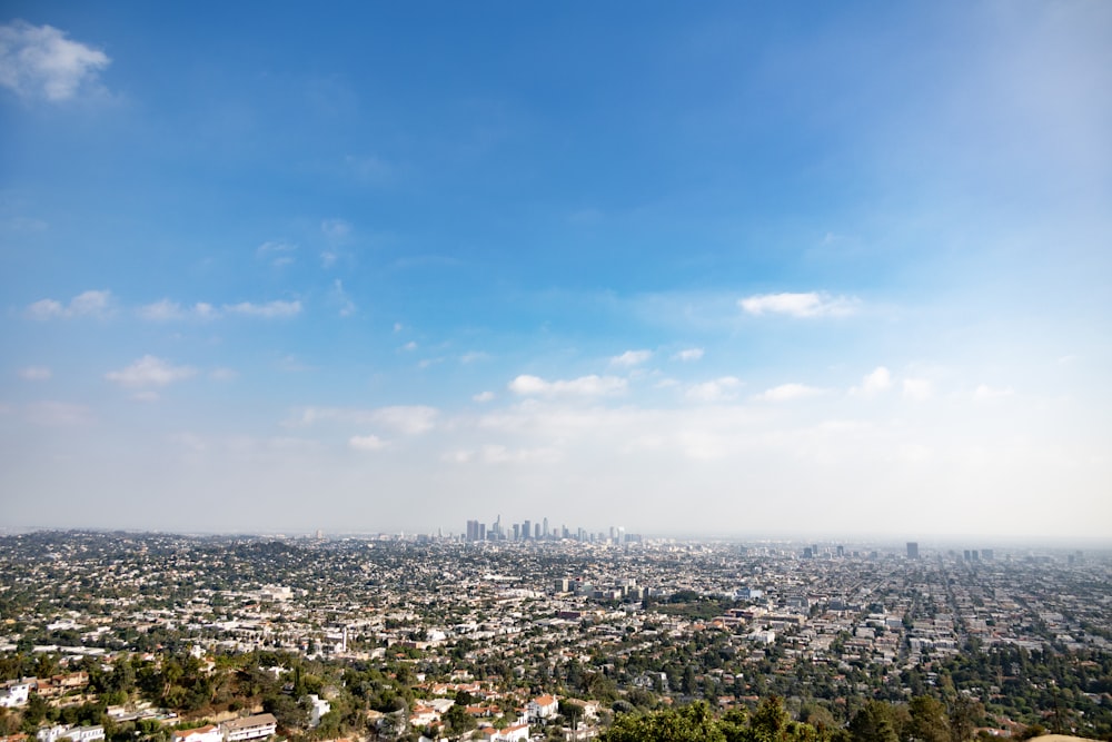 a view of a city from the top of a hill