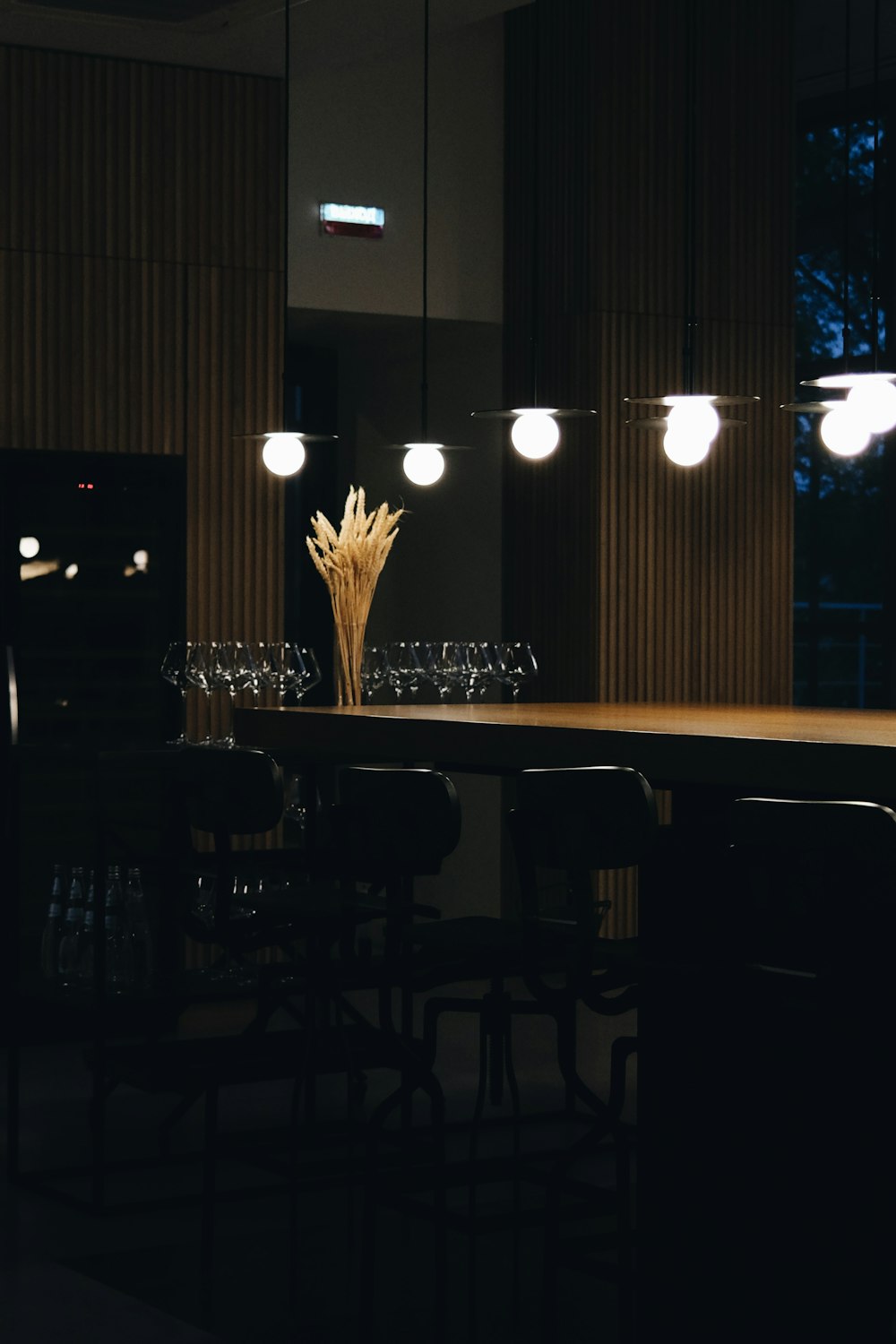 a table with a bunch of wine glasses on it