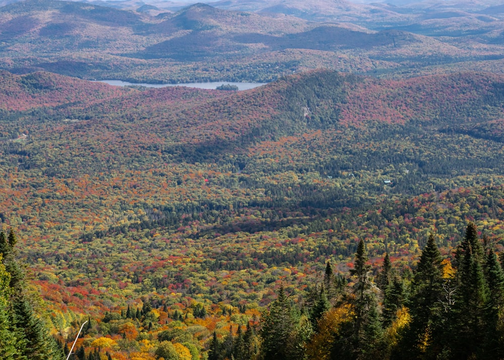 a view of a mountain range with a lake in the middle