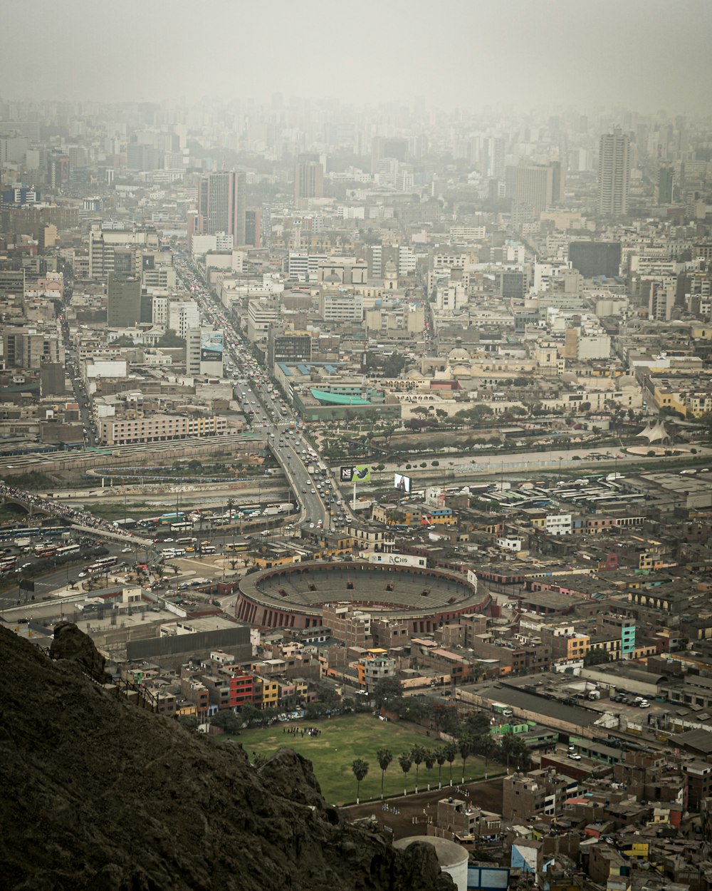 an aerial view of a city with lots of tall buildings