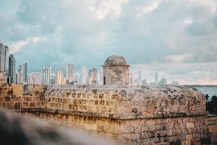 a view of a city from the top of a wall