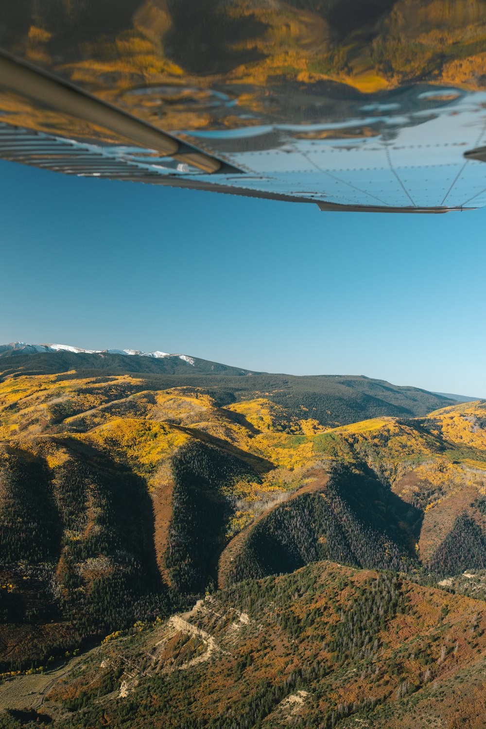 a view of a mountain range from an airplane