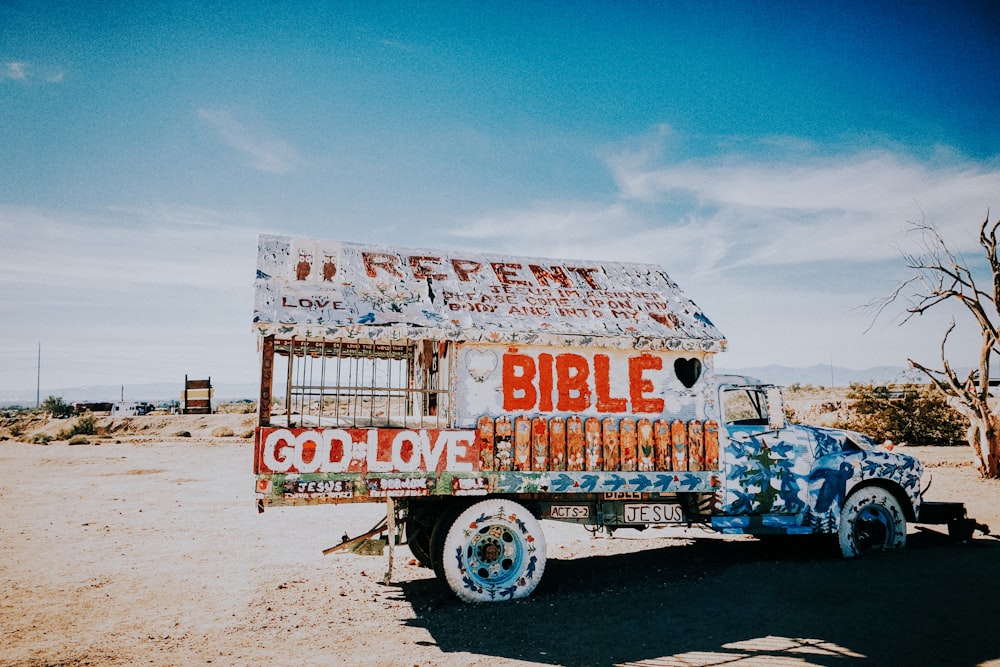 a truck that is sitting in the dirt