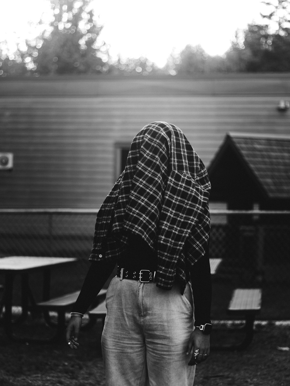 a man standing in front of a trailer