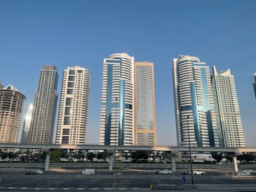 a group of tall buildings sitting next to each other