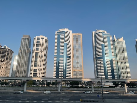 a group of tall buildings sitting next to each other