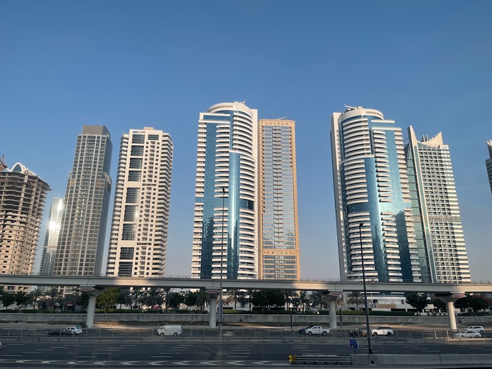 a group of tall buildings sitting next to each other