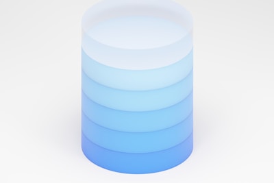 a stack of stacked blue and white plates