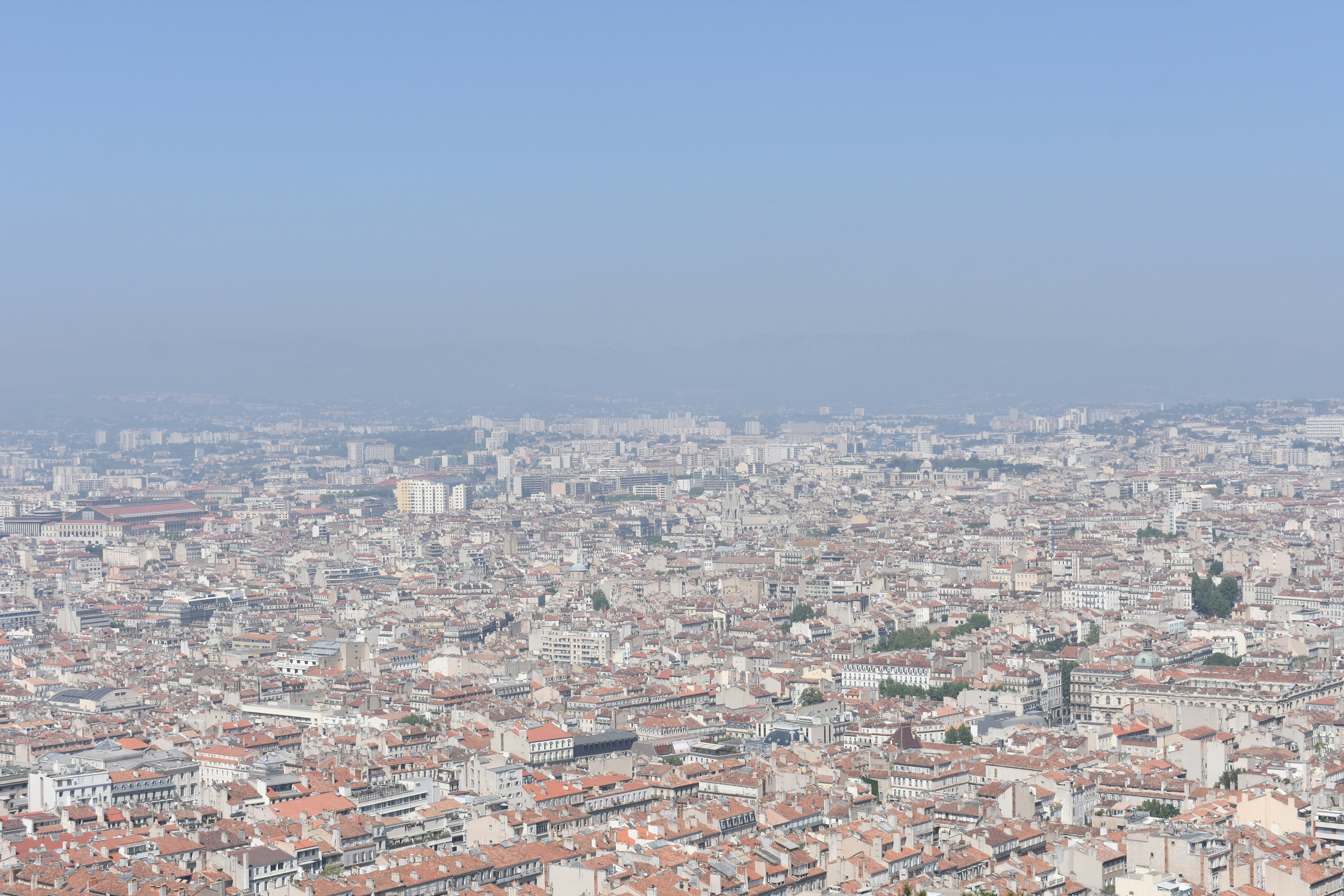 a view of a city from the top of a building