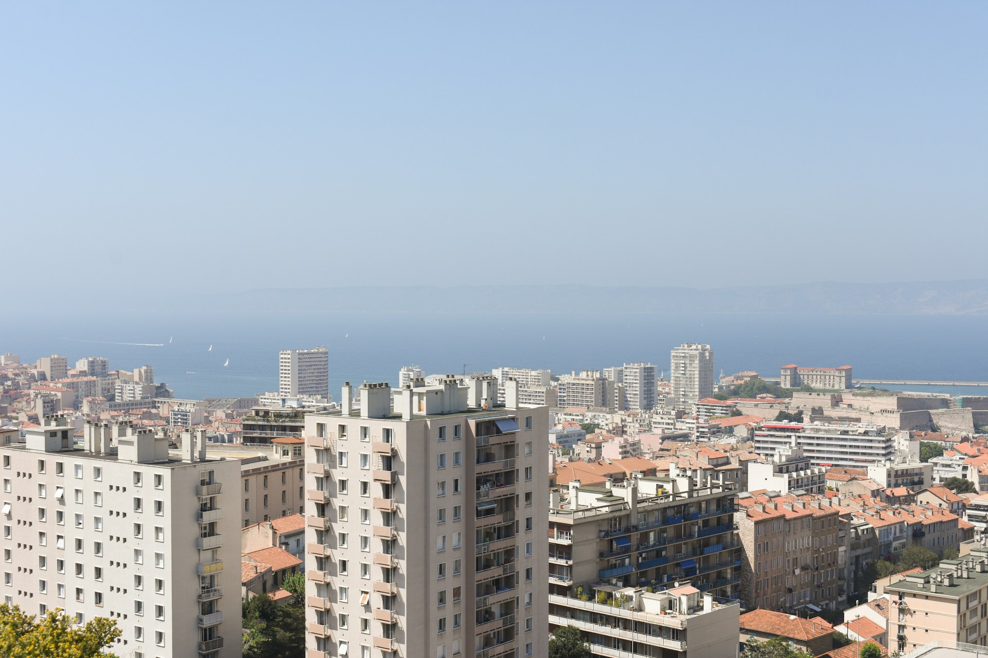 a view of a city from the top of a building