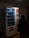 A happy customer using a Vision Vending machine.