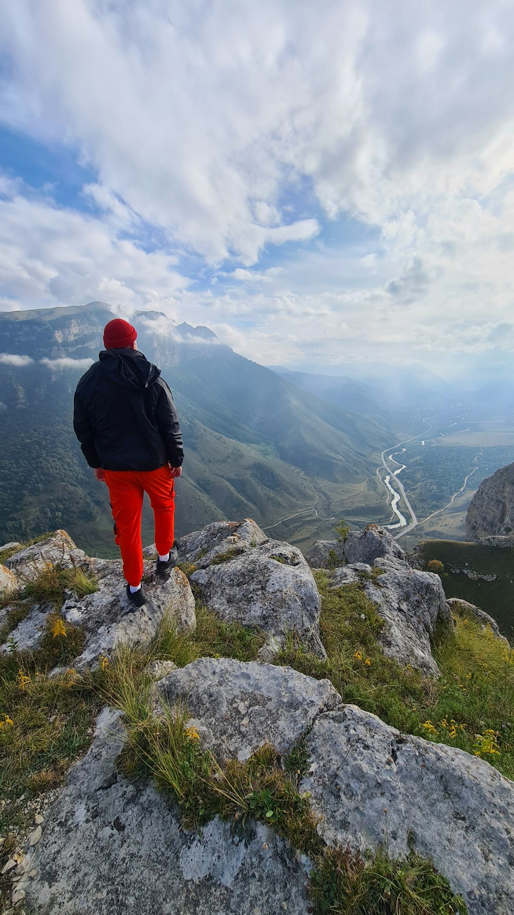 a person standing on top of a mountain