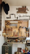 a workbench filled with lots of tools
