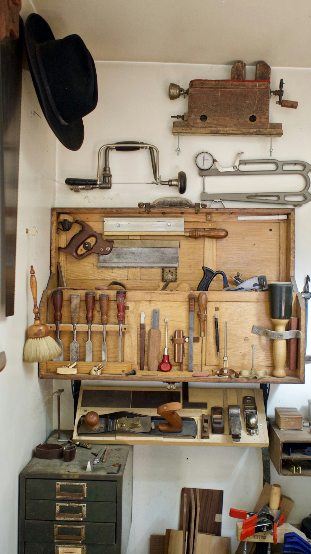 a workbench filled with lots of tools