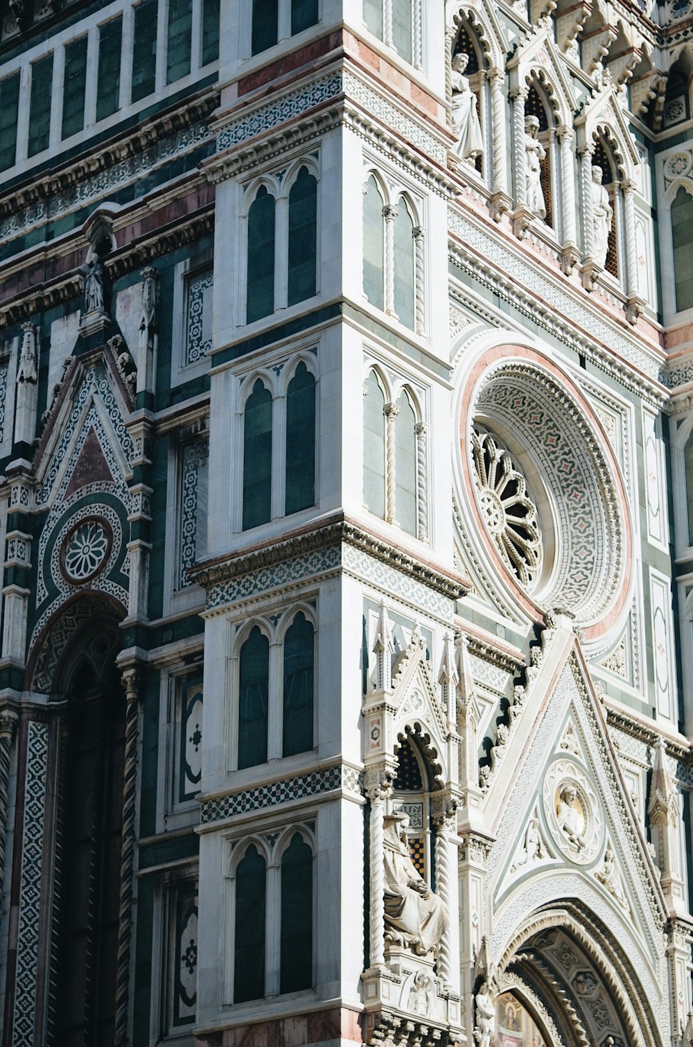 a very tall building with a clock on it's side