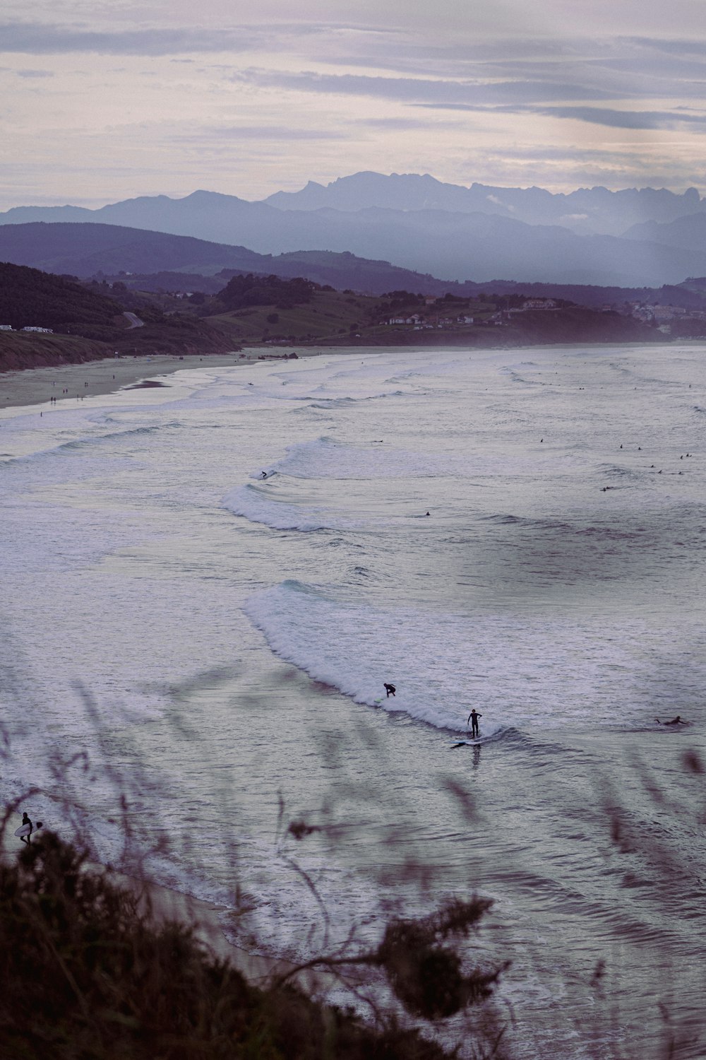 a person riding a surfboard on a body of water