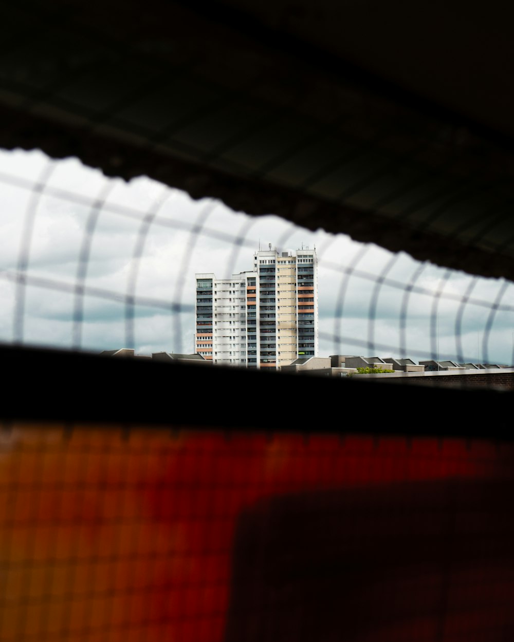 a view of a tall building from a window