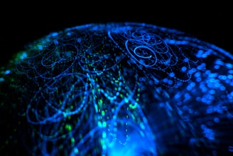 a close up of a blue and black object