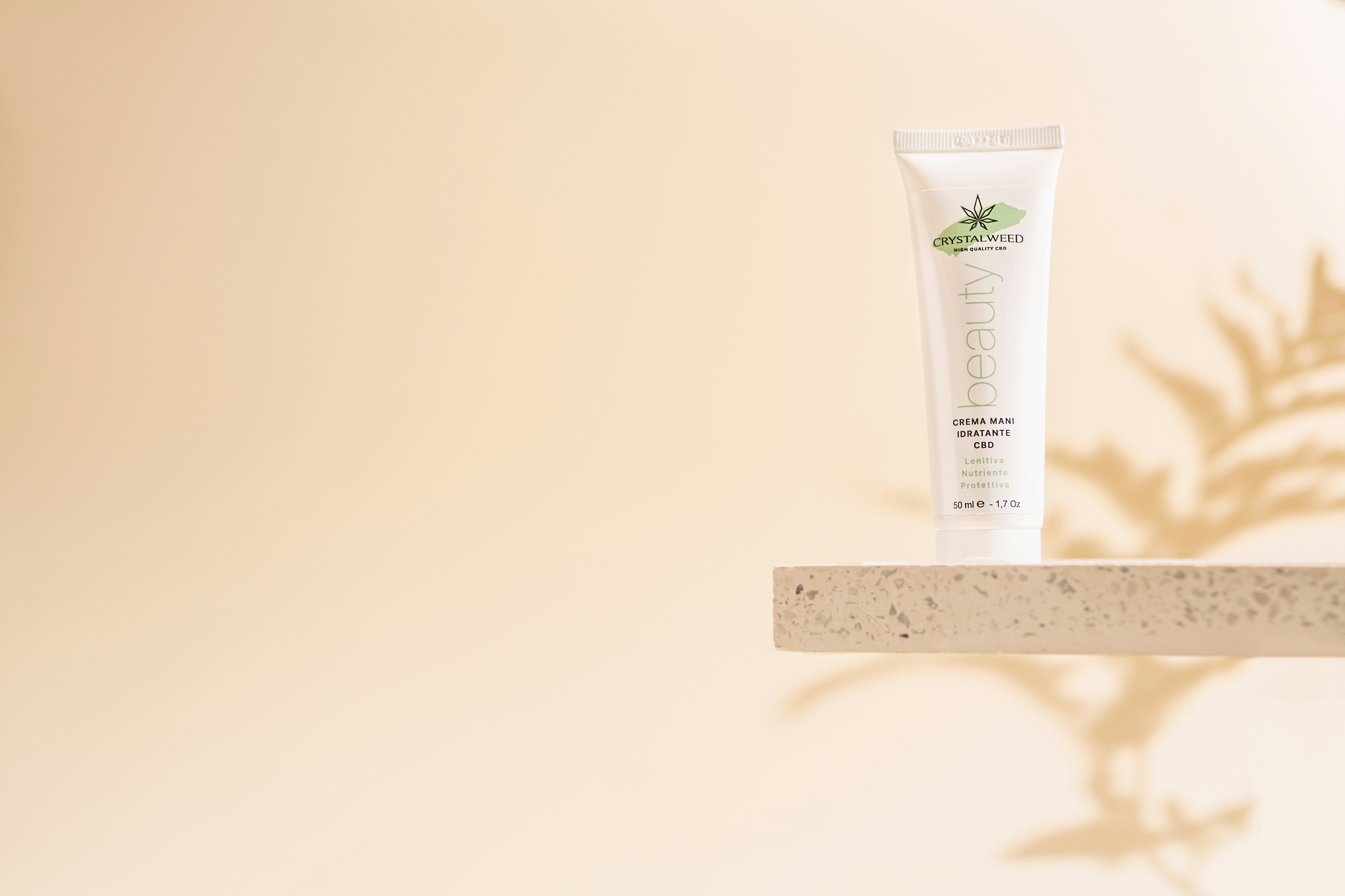 a tube of cream sitting on top of a shelf