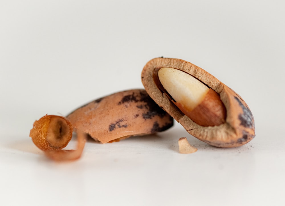 a half eaten banana sitting on top of a white table