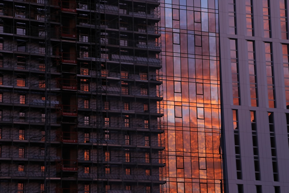 a very tall building next to a very tall building