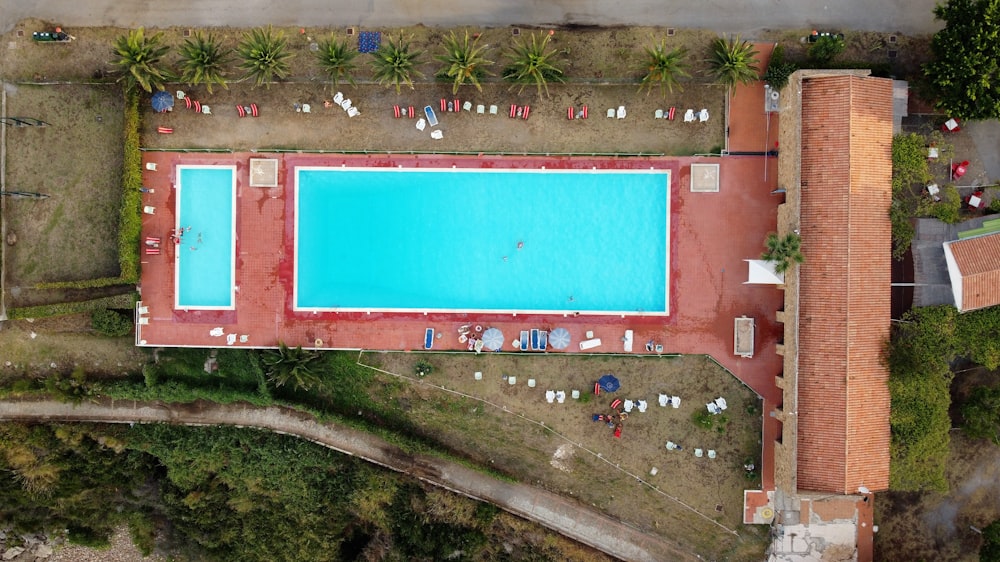 an aerial view of a swimming pool in a park
