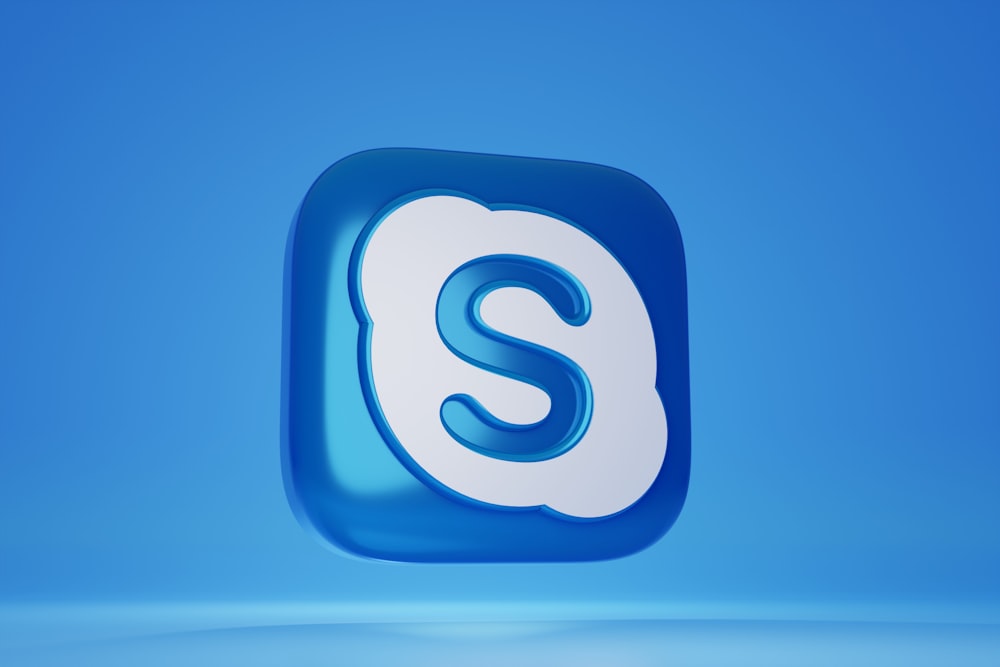 a blue square with a white s on it