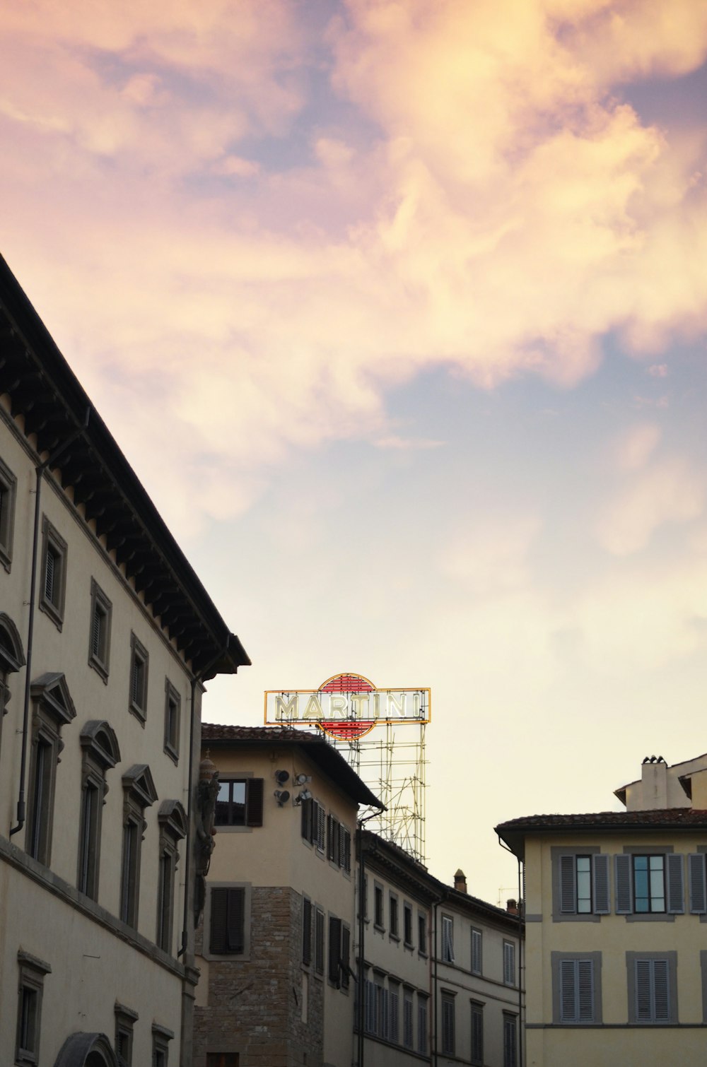 a building with a red sign on top of it