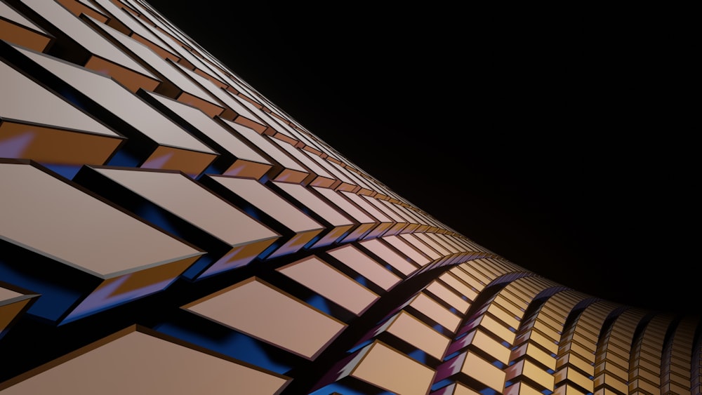 a close up of a building with a black sky in the background