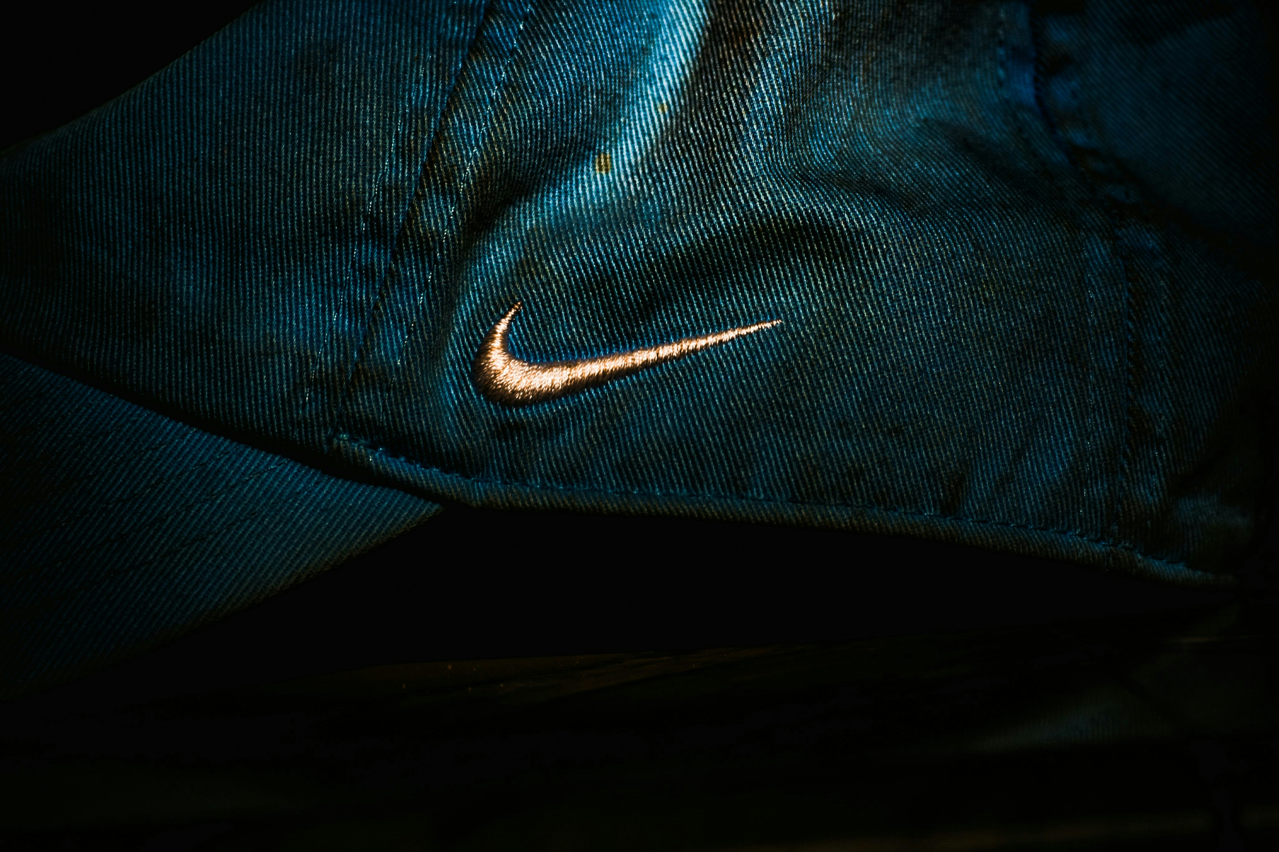 a close up of a hat with a nike logo on it