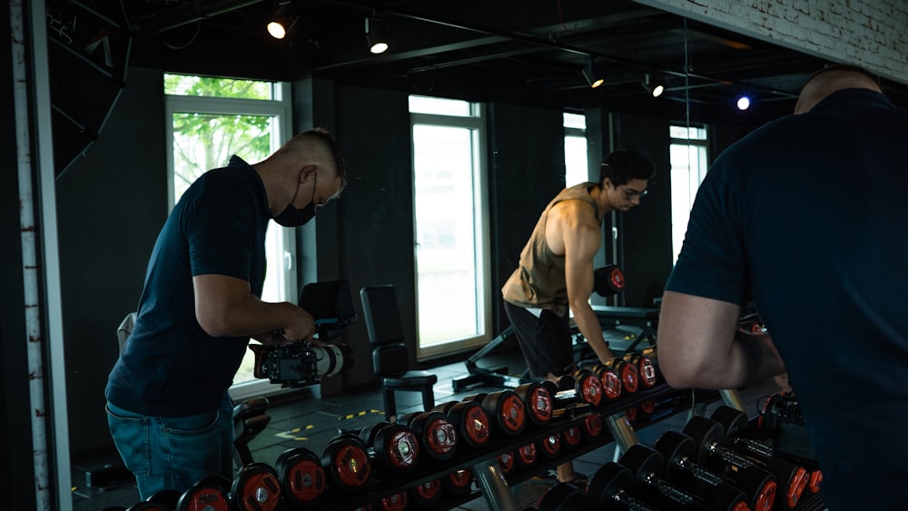 a group of men working out in a gym