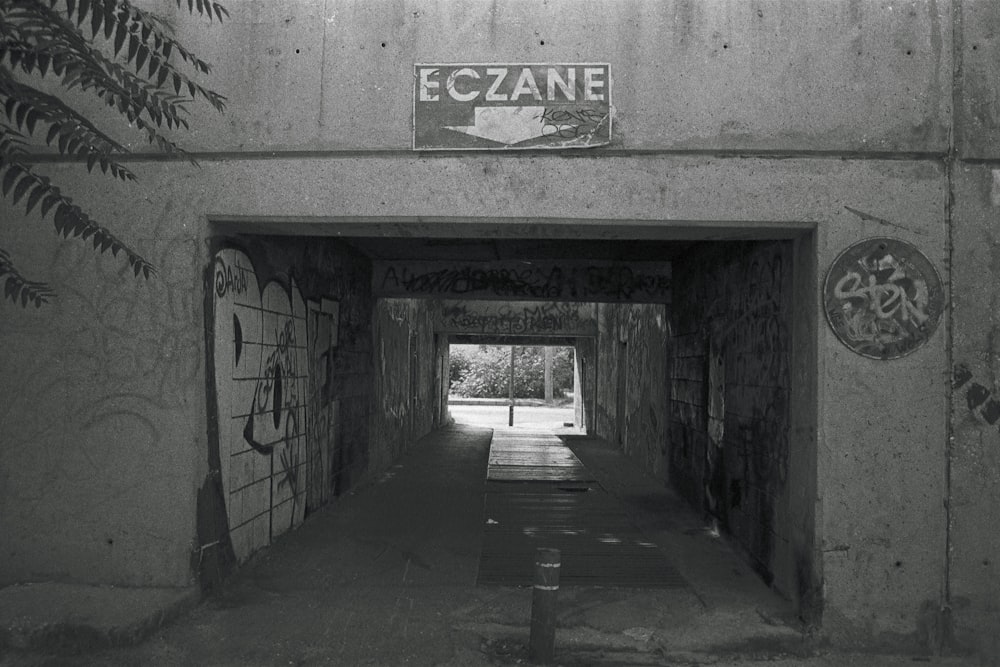 a black and white photo of a tunnel