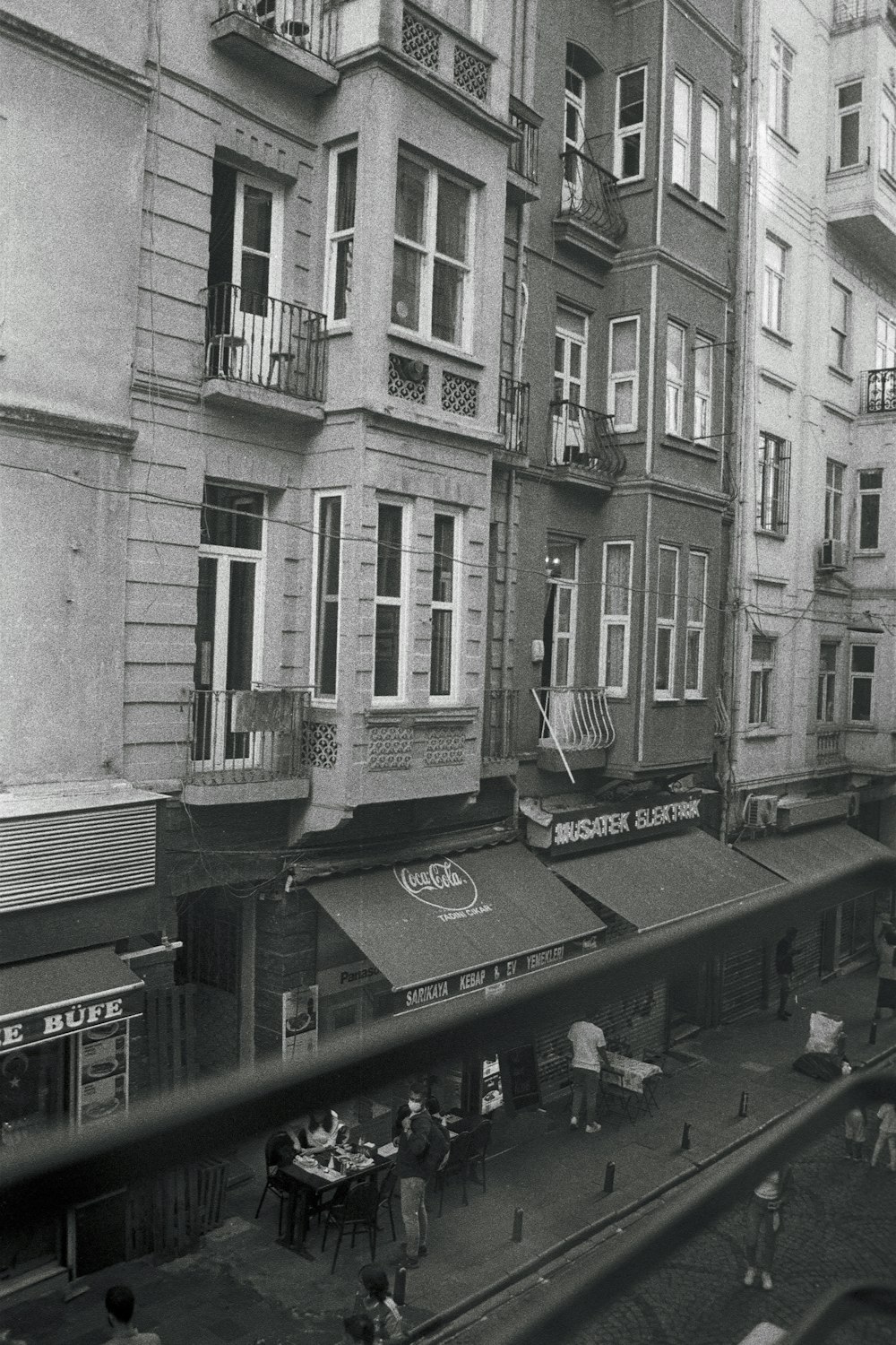 a black and white photo of a city street