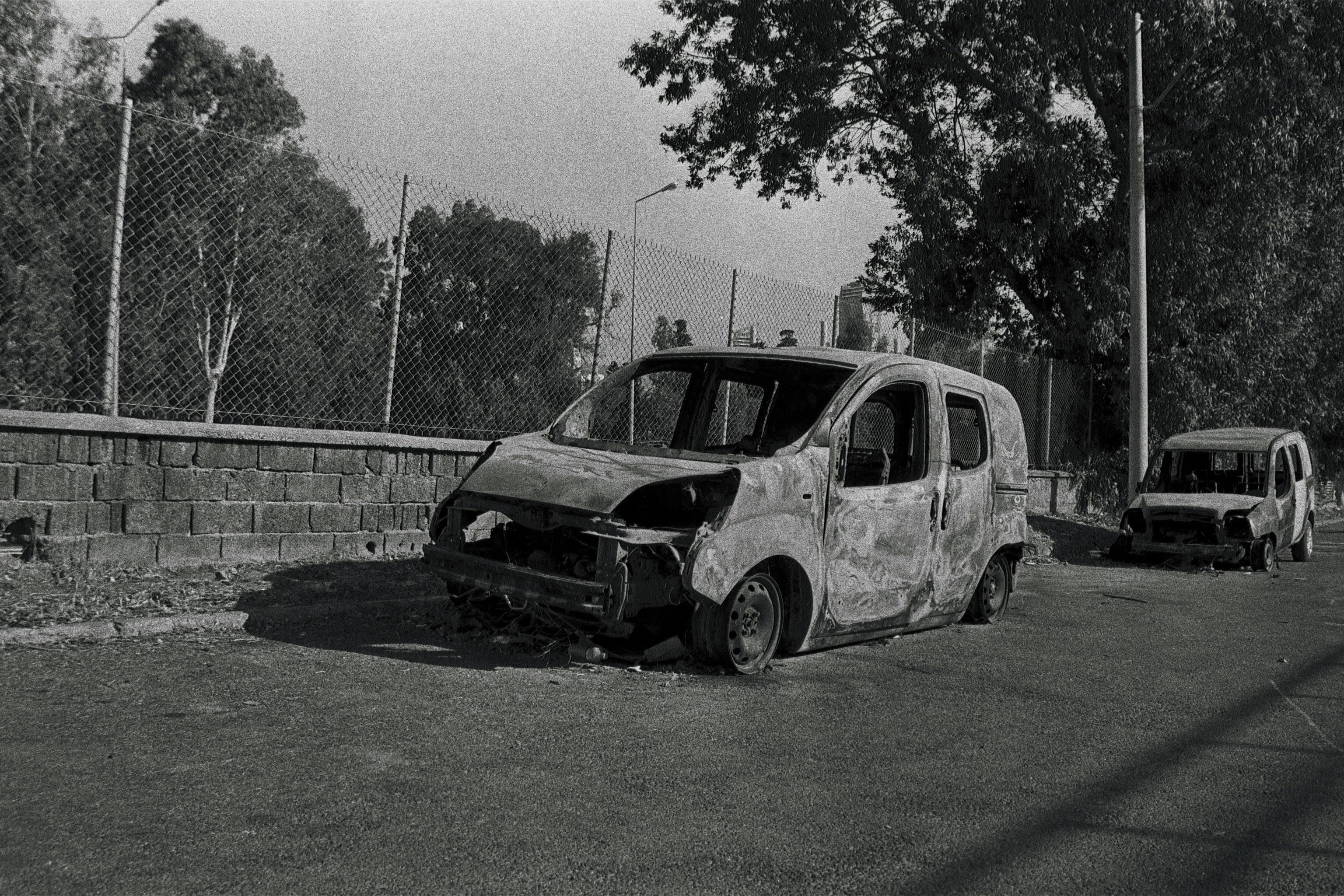 a black and white photo of a broken down van, As mine other albums, all photos were taken by me.</p><p>Nikon FE2 - Ilford HP5 