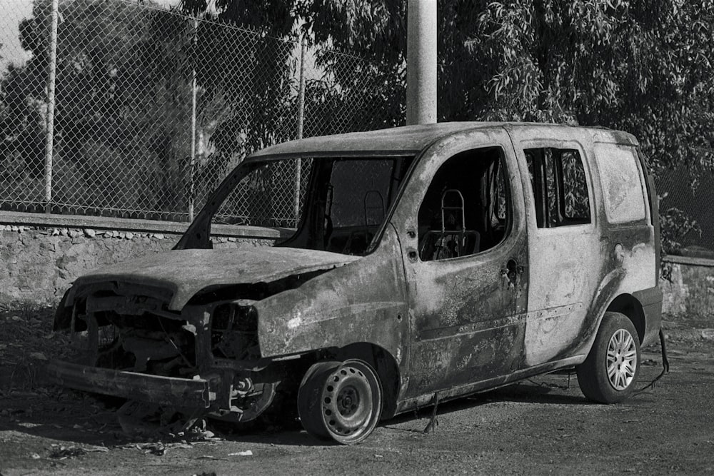 a van that is sitting in the dirt