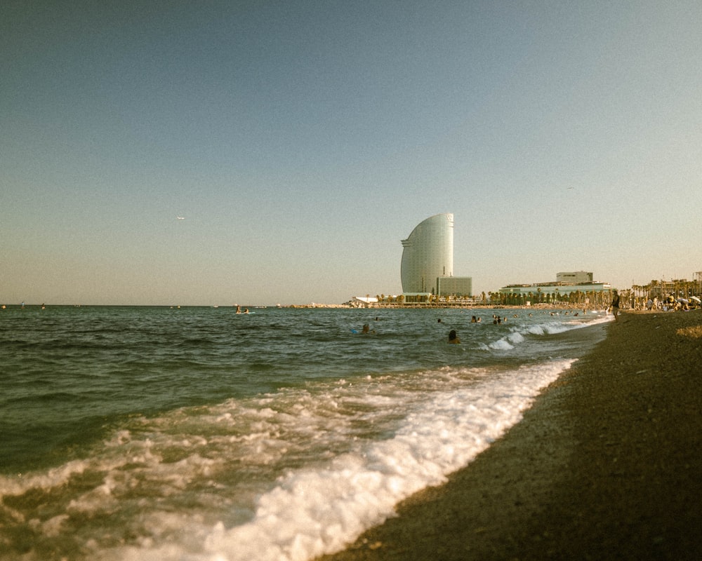 a view of a body of water with a building in the background