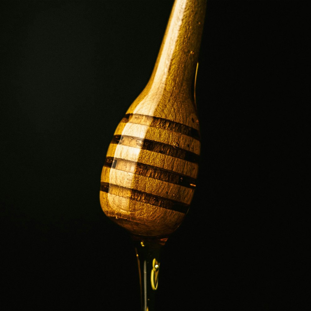 a wooden spoon sitting on top of a table