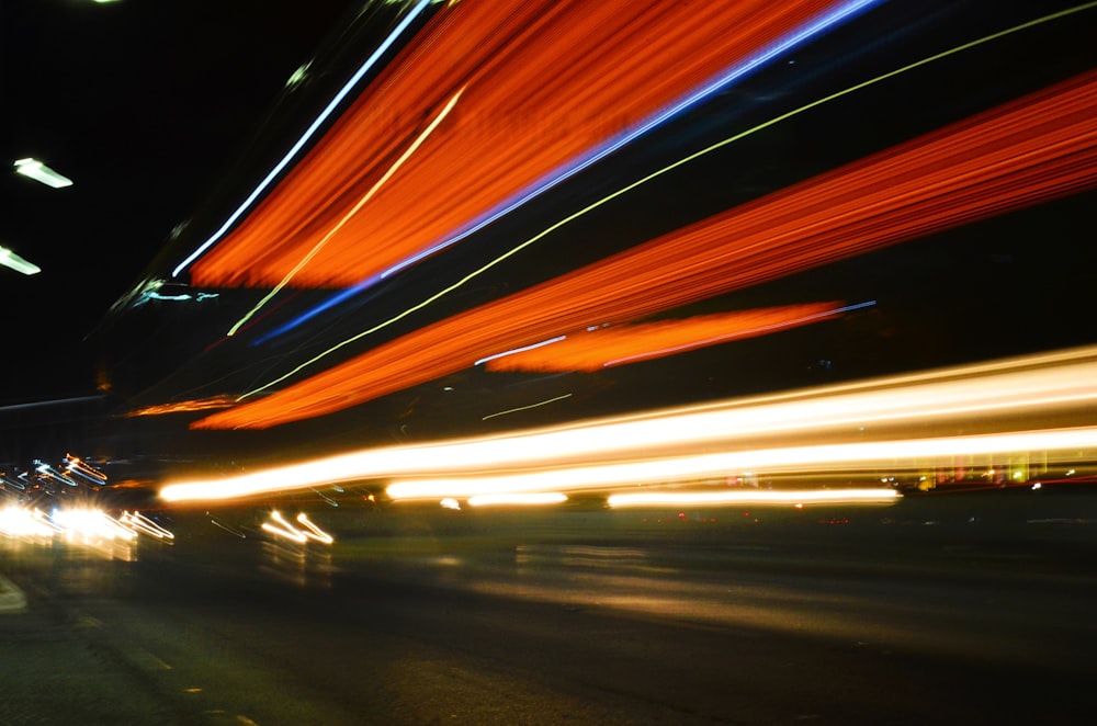 a blurry photo of a city street at night