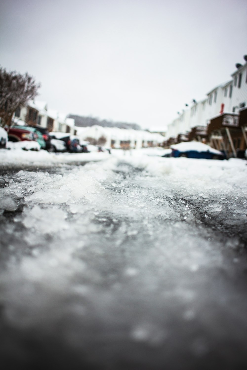 a street that has some snow on it