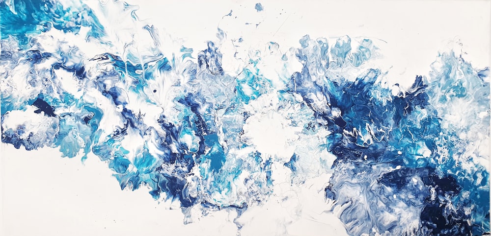a painting of blue and white paint on a white background